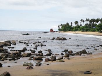 Scenic view of beach against sky