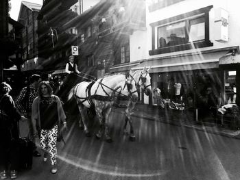 Woman standing on city street