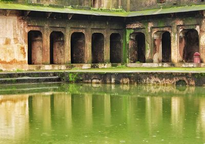 Reflection of old building in water