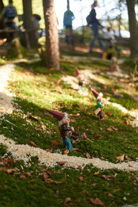 Children playing with toy on field