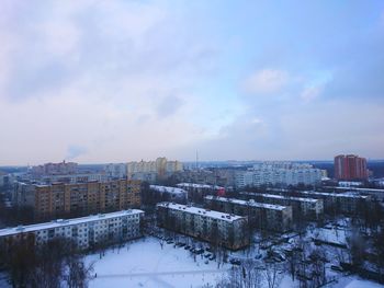 Cityscape against sky during winter