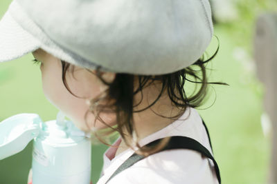 Close-up of girl drinking water 