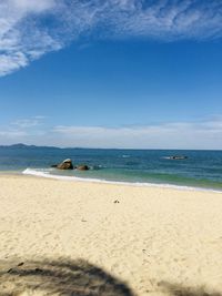 Scenic view of beach against sky