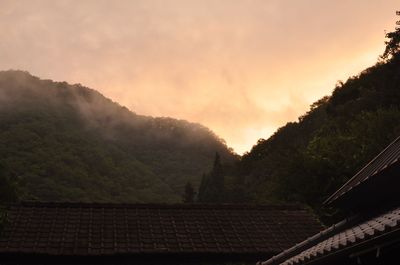 Scenic view of mountains against sky during sunset