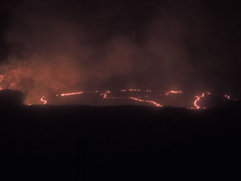 Scenic view of lightning against sky at night
