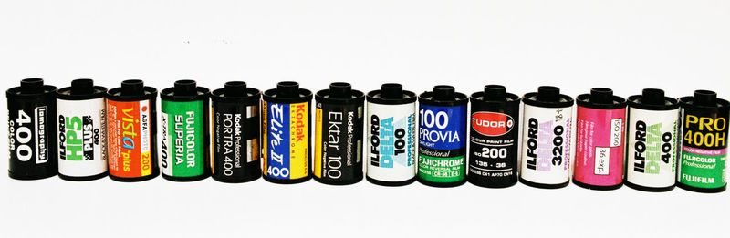 Close-up of multi colored pencils in row