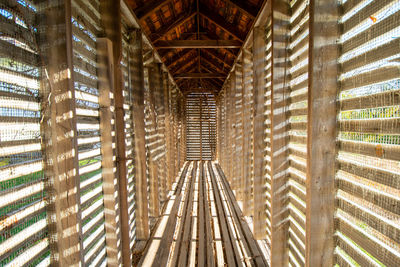 Directly below shot of roof ceiling of building