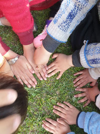 High angle view of people holding hands