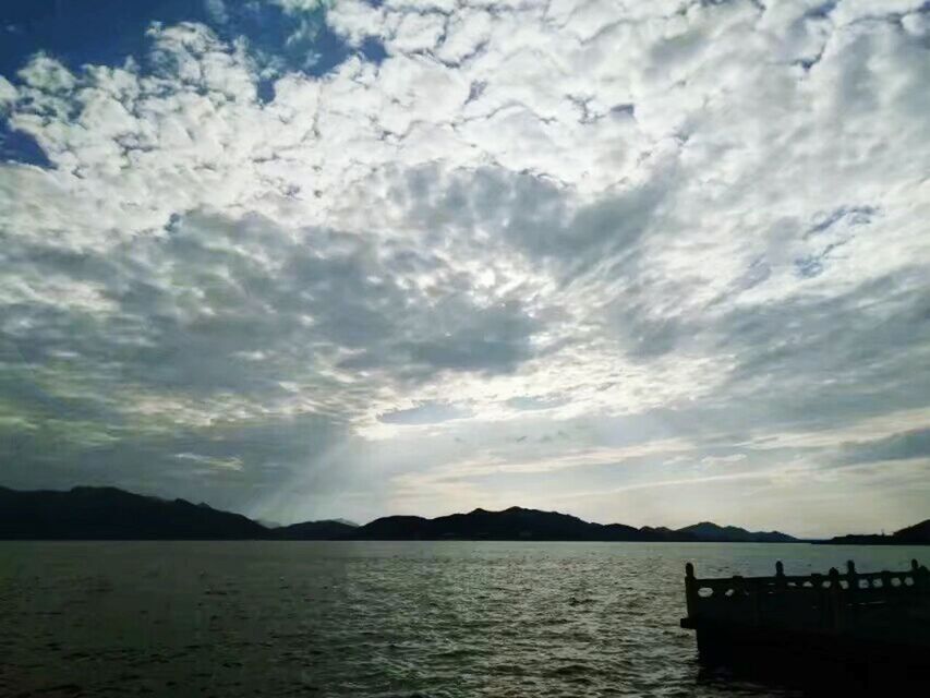 cloud - sky, sky, scenics, nature, tranquility, beauty in nature, water, mountain, sea, tranquil scene, no people, outdoors, silhouette, day