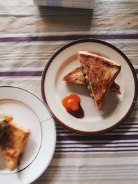 High angle view of breakfast served in plate on table