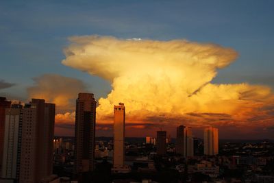 Cityscape against sky during sunset