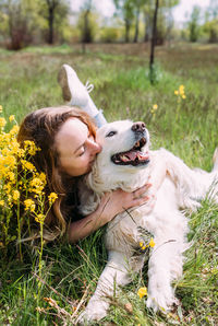 Close-up of dog on field