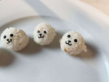 Kids meal - cute rice balls on table