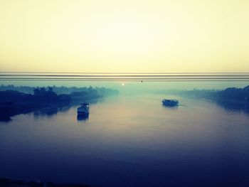 Scenic view of lake against clear sky