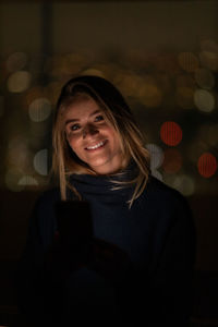 Portrait of young woman looking away