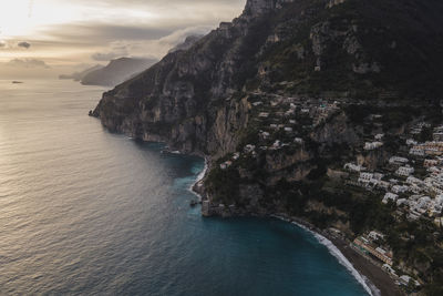 Aerial view of townscape by coast