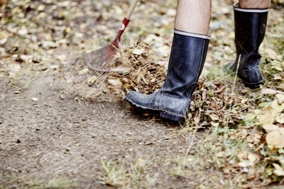 Man wearing wellingtons