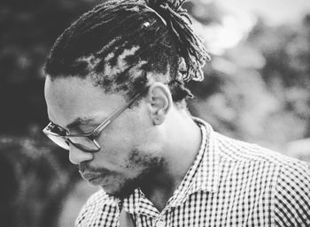 Portrait of young man looking away