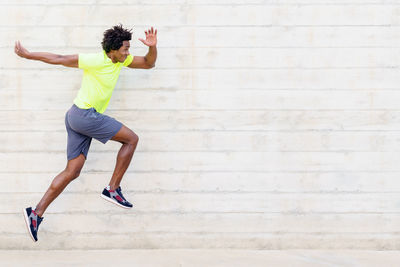 Full length of man jumping outdoors