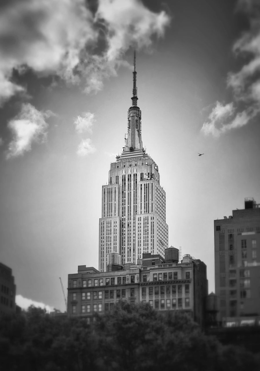 LOW ANGLE VIEW OF BUILDINGS AGAINST SKY