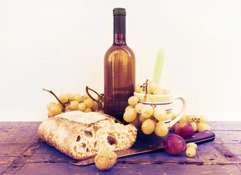 Close-up of fruits in plate on table