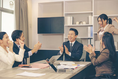 Business colleagues working at office