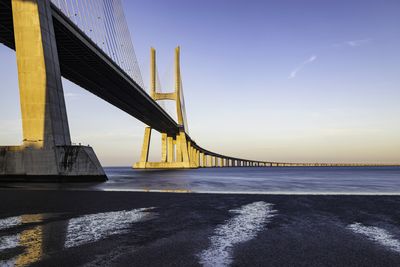 View of bridge over sea against sky