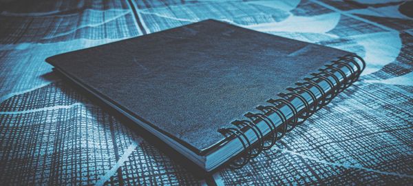 High angle view of open book on table