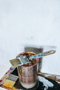 Close-up of ice cream in glass jar on table