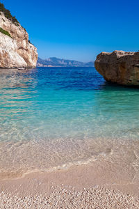 Scenic view of sea against sky at the beach cala mariolu in baunei, sardinia