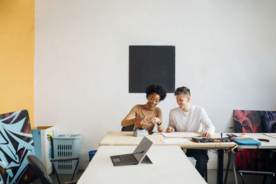 Men sitting on table