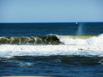 Scenic view of sea against clear sky