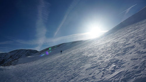 Scenic view of snowcapped mountain against sky