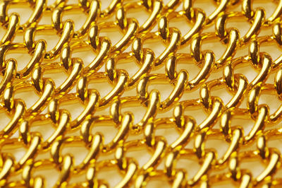 Full frame shot of golden chains 