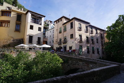 View of residential buildings against sky