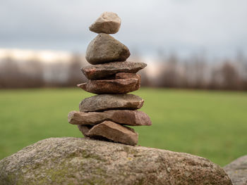 Close-up of stone stack on rock