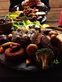 Close-up of man holding food