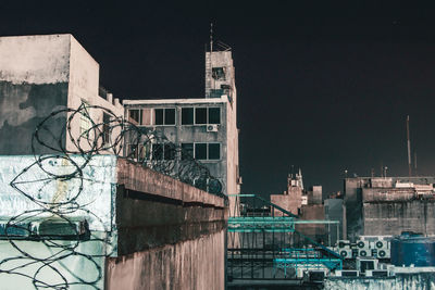 Prison in city at night