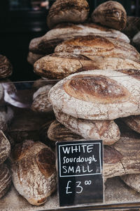 Stack of breads at bakery for sale