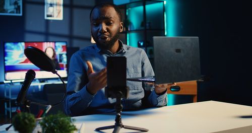 Portrait of young man working at office