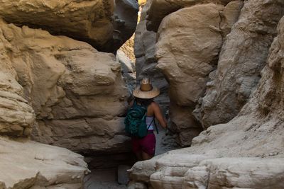 Woman standing on rock