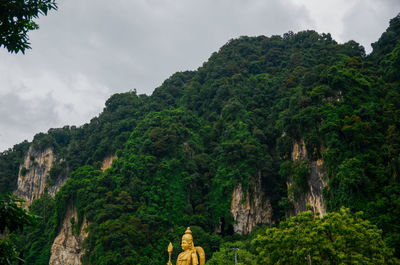 The cave is the focal point of hindu festival of thaipusam and deepavali in batu caves, malaysia.