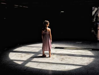 Full length of girl standing outdoors
