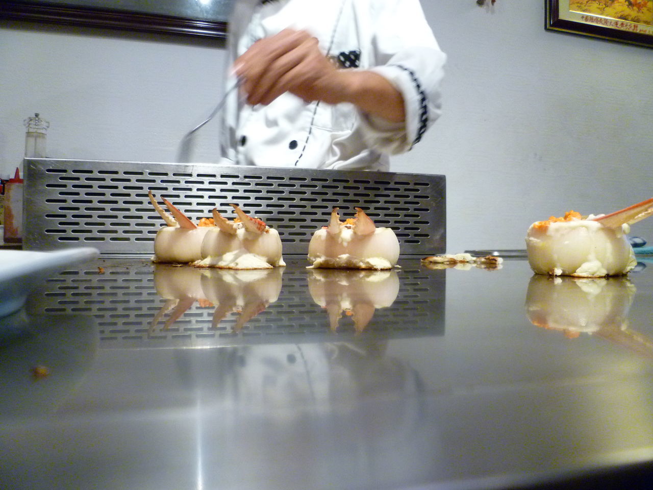 CLOSE-UP OF HAND PREPARING FOOD