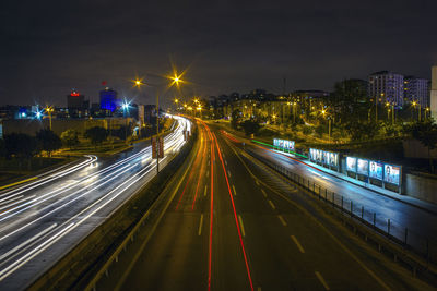 High angle view of light trails on city at night