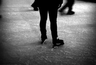 Low section of woman standing on floor