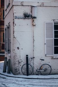 Bicycle parked outside building
