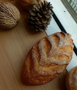 High angle view of bread on cutting board