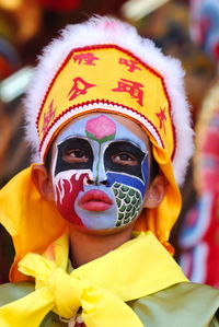 Close-up of boy wearing carnival costume