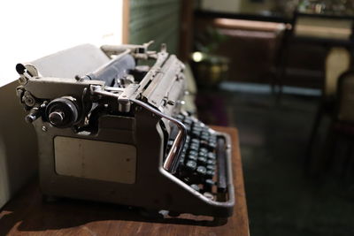 Close-up of old vintage car on table